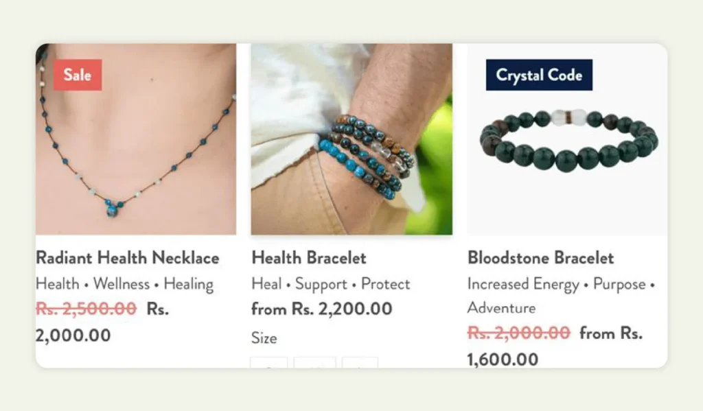 Display of various healing crystal bracelets with price tags 