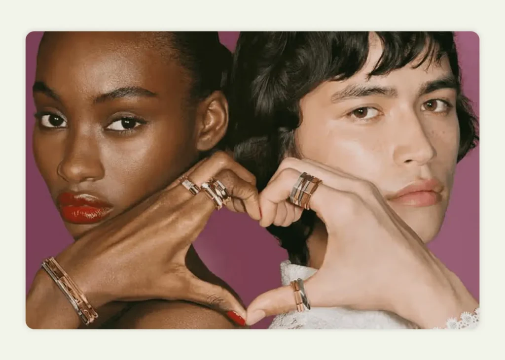 Two diverse models showcasing matching gold and silver rings 