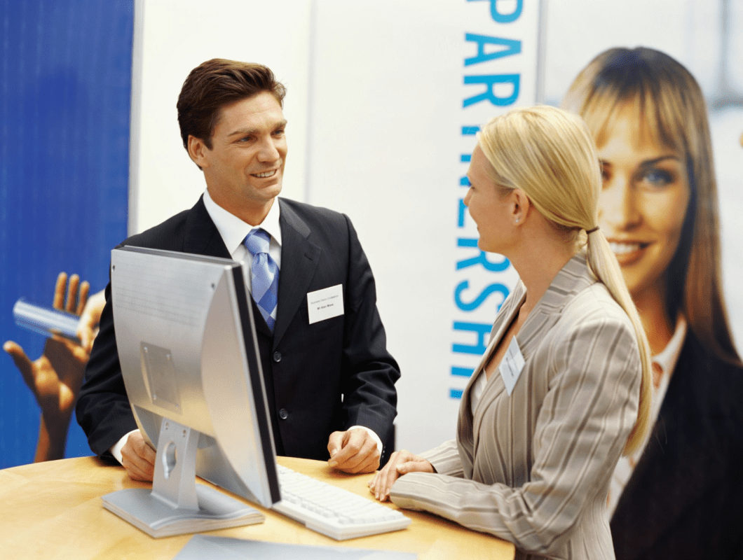 Welcome visitors at the High Point Market with a friendly smile and a warm greeting to make them feel valued and comfortable.