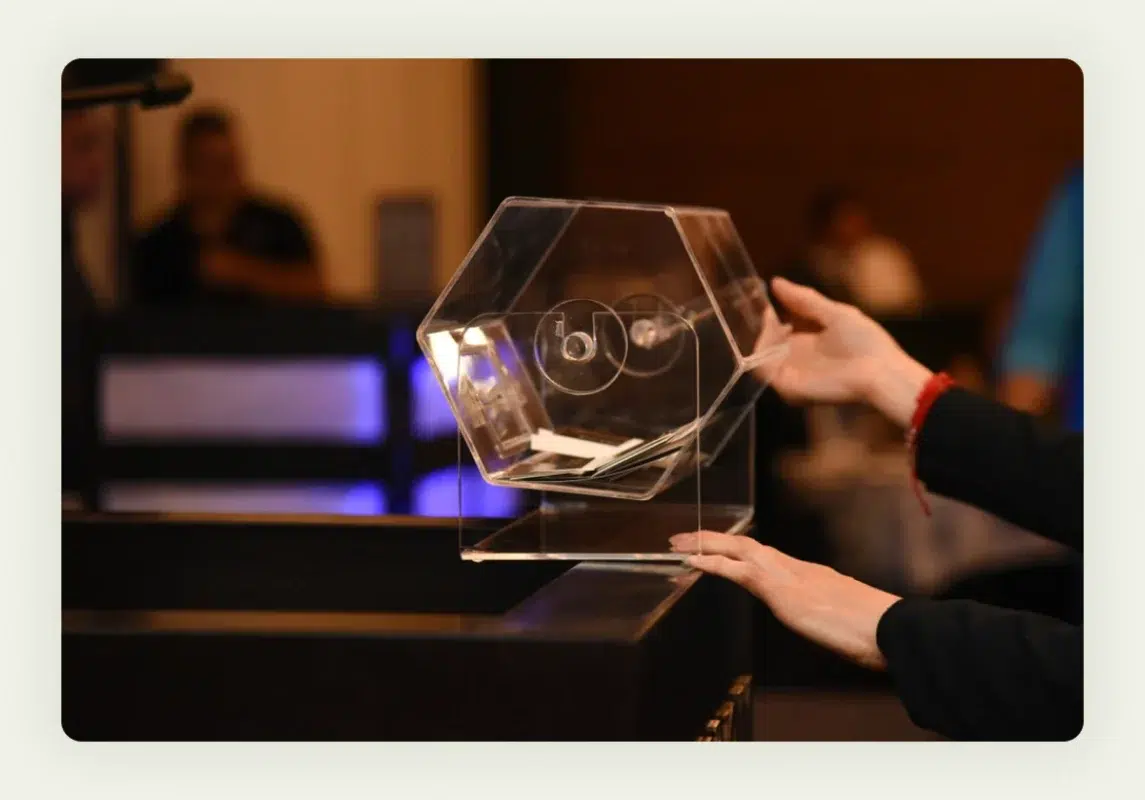 Glass fishbowl filled with business cards for trade show raffle contest Glass fishbowl filled with business cards for trade show raffle contest