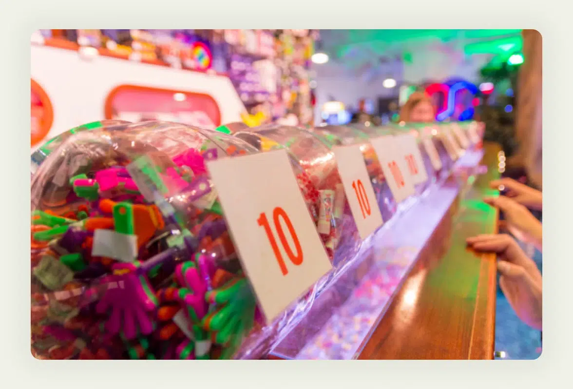 Large branded jar filled with colorful candies for trade show guessing game contest Large branded jar filled with colorful candies for trade show guessing game contest