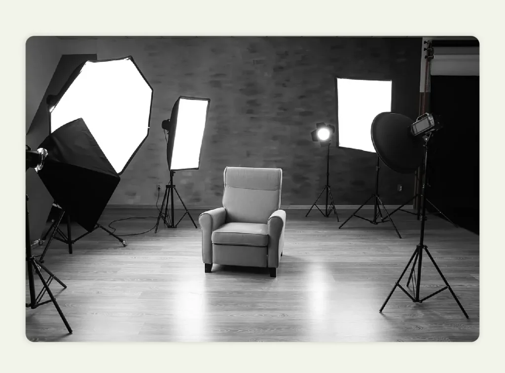 Product photography setup with two softboxes at 45degree angles lighting a sofa