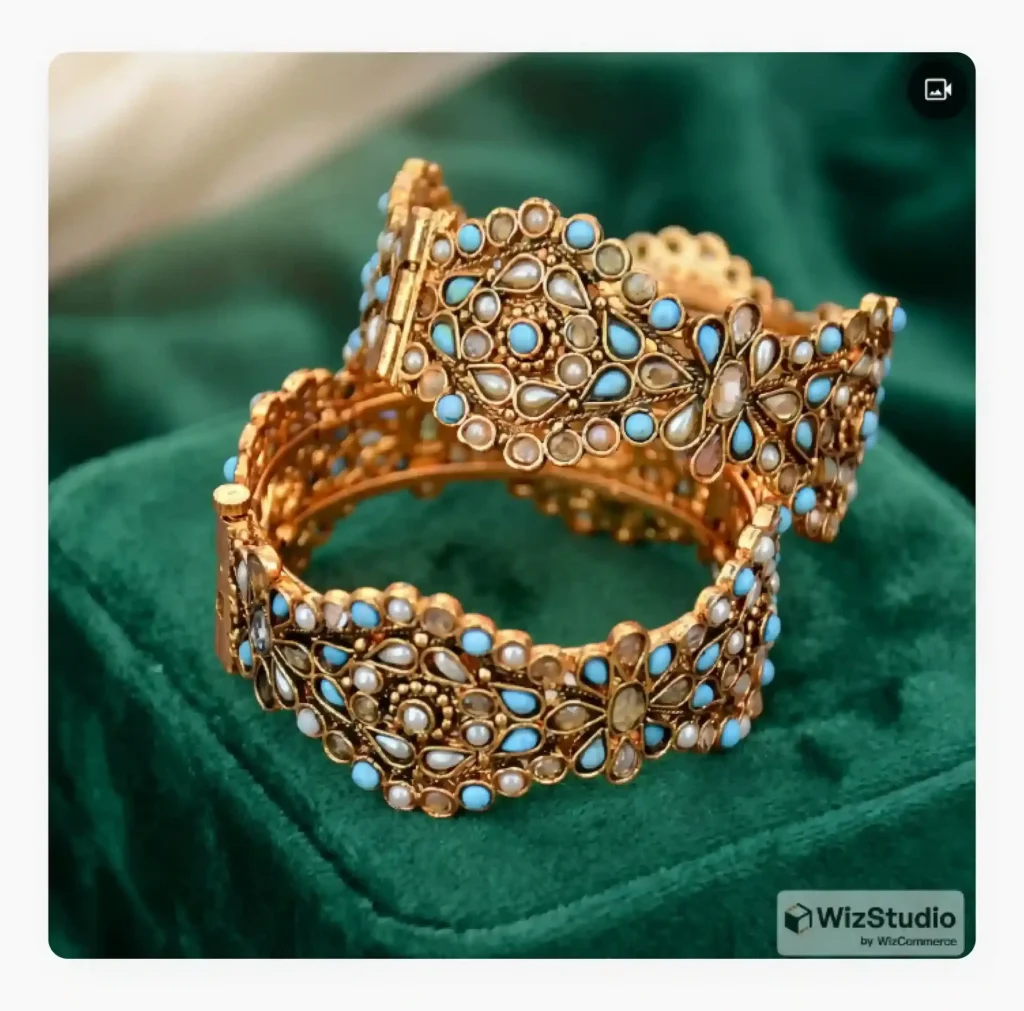 A pair of bangles placed on top of a velvet platform using WizStudio replace background feature 